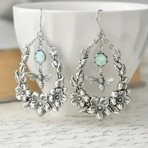 Vintage tear drop shaped bee and flower drop earrings